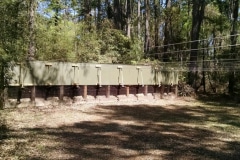 An outdoor shooting range with a target retrieval system.